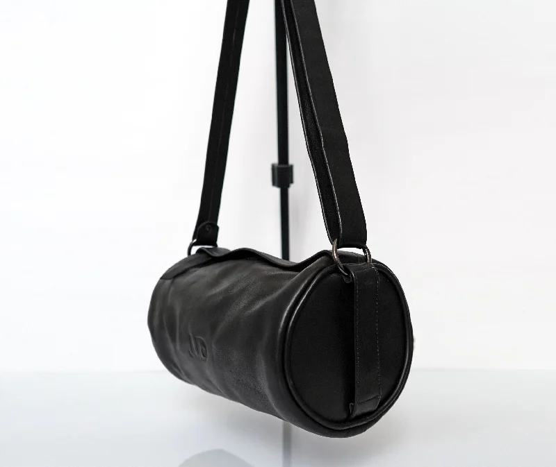 Color - blocked hobo bag with bold and contrasting colors3-in-1 Black Leather Tube Bag