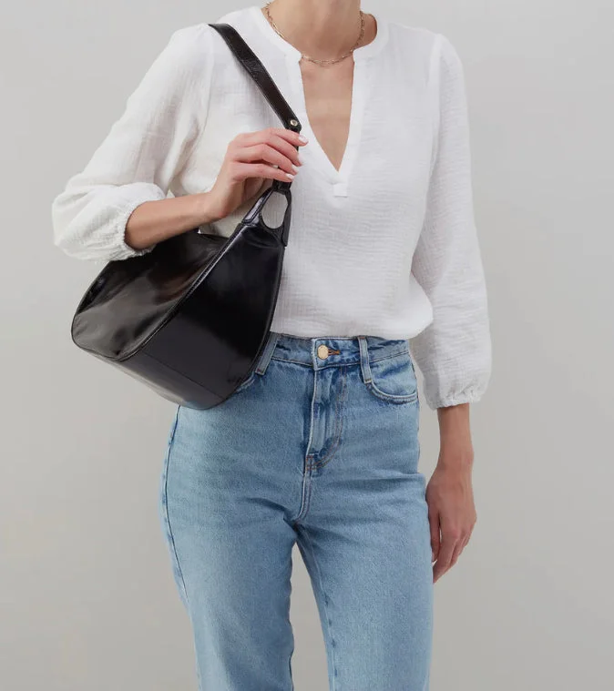 Hobo bag with a tassel - trimmed strap for a playful touchArla Shoulder Bag