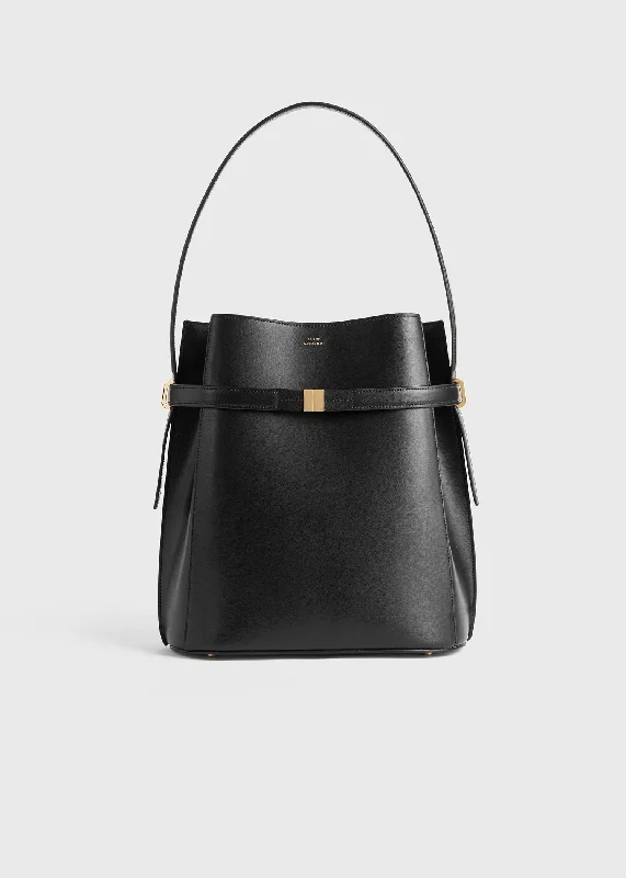 Bucket bag with a hidden anti - theft pocket for securityBelted leather bucket bag black