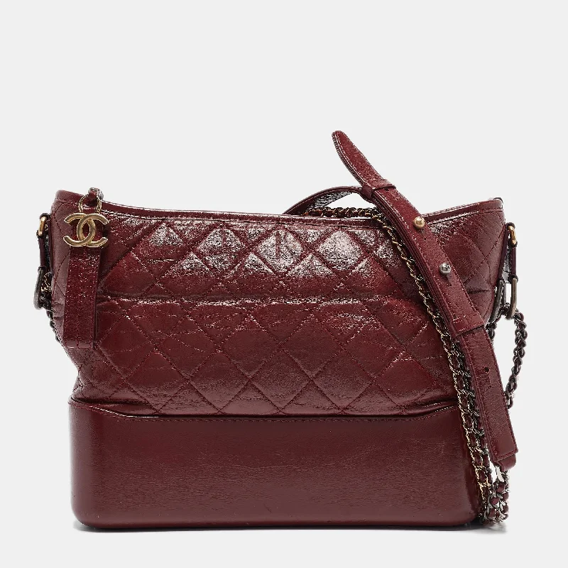 Studded hobo bag with a punk - rock edgeChanel Red Quilted Leather Medium Gabrielle Hobo