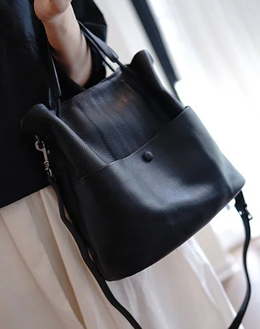 Color - blocked bucket bag with bold and bright hues for a statement pieceCute Black Leather Bucket Tote Shoulder Bag Women Barrel Tote Handbag for Women