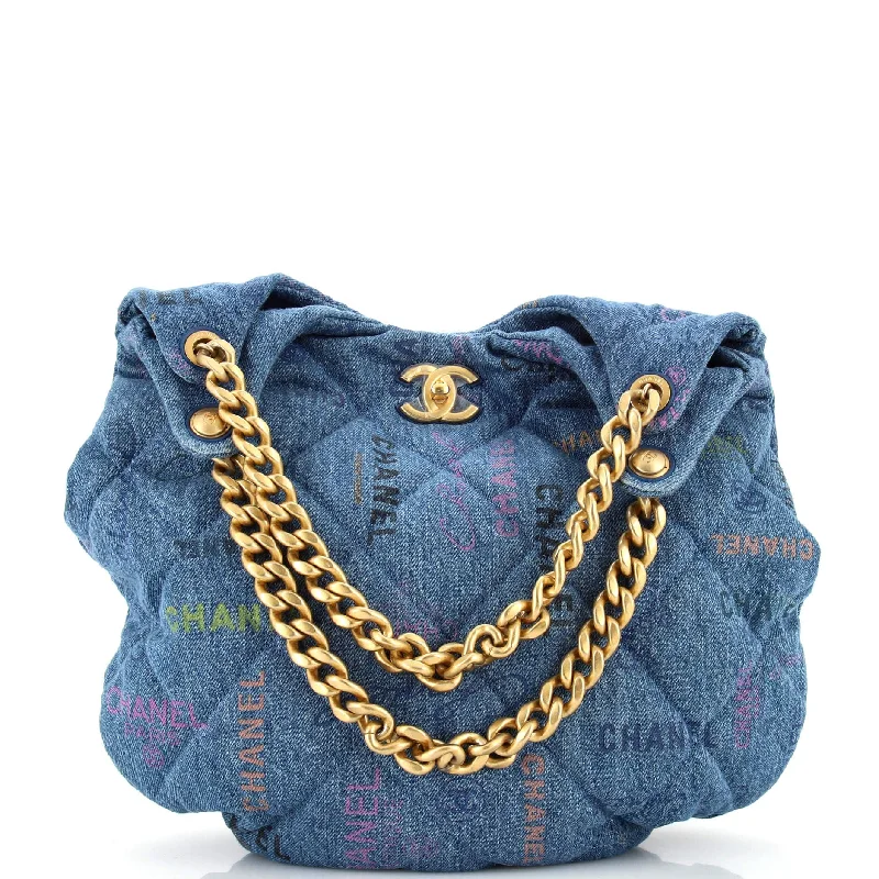 Color - blocked hobo bag with bold and contrasting colorsDenim Mood Hobo Logo Printed Quilted Denim Maxi