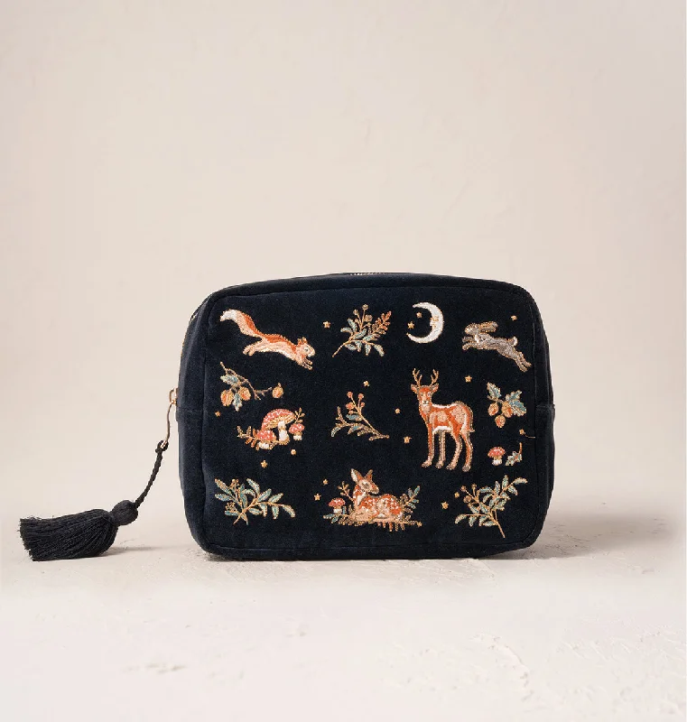 Women's leather makeup bag with a hand-stitched border and gold zippersEnchanted Woodland Wash Bag