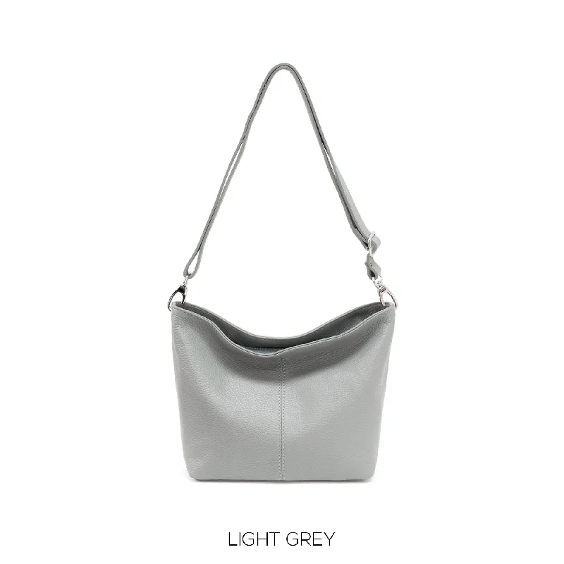 Hobo bag with a tassel - trimmed strap for a playful touchGenuine Leather Bucket Bag