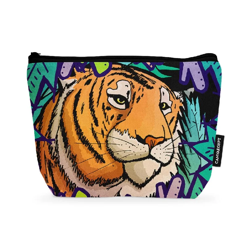 Vintage-inspired leather makeup bag with a brass clasp and tasselMakeup Pouch Tiger in the jungle