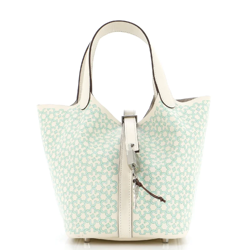 Convertible bucket bag that can be worn as a cross - body or shoulder bagPicotin Lock Bag Lucky Daisy Printed Swift PM