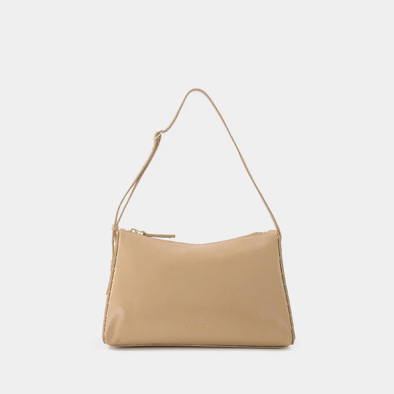 Metallic hobo bag with a shiny finish for evening outingsPrism Hobo Bag - Manu Atelier - Beige - Leather