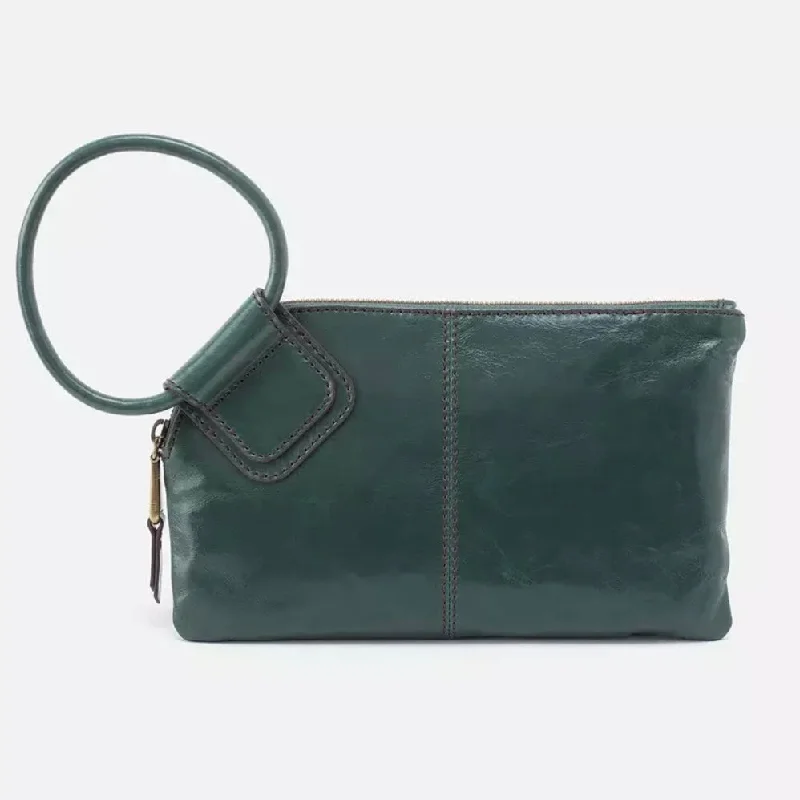 Hobo bag with a tassel - trimmed strap for a playful touchSable Clutch