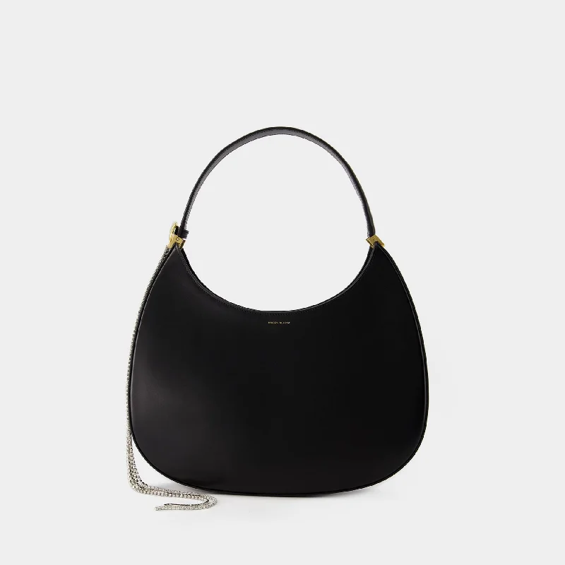 Soft suede hobo bag in a warm earth - tone color for autumnLarge Vesna Hobo Bag - Magda Butrym - Leather - Black