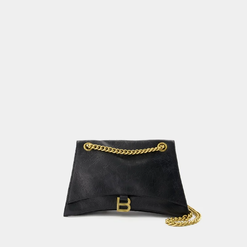 Metallic hobo bag with a shiny finish for evening outingsCrush Chain M Shoulder Bag - Balenciaga - Leather - Black