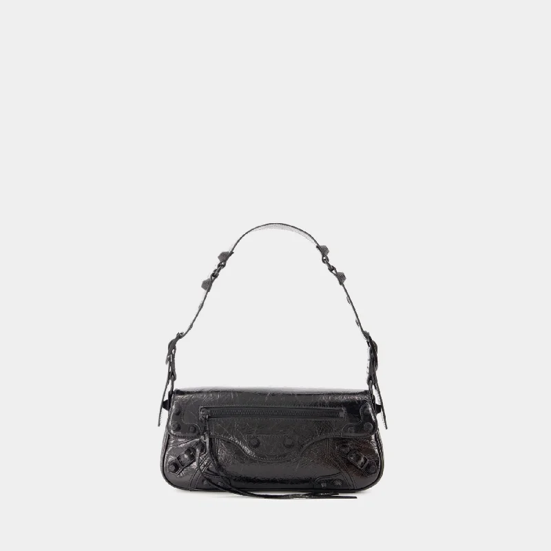 Hobo bag with a magnetic snap closure for easy accessLe Cagole Sling S Shoulder Bag - Balenciaga - Leather - Black