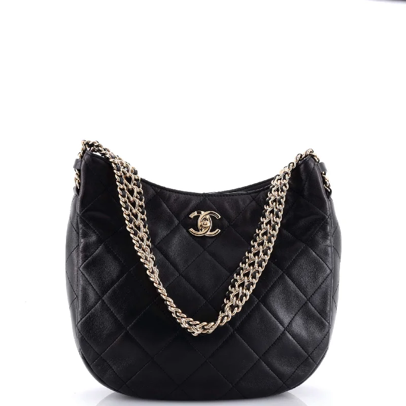 Cross - body hobo bag with an adjustable strap for hands - free carryingWide Chain CC Turnlock Hobo Quilted Lambskin Small