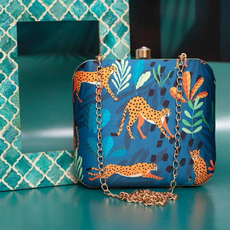 Clutch with a removable strap to be used as a hand - held or cross - bodyArtklilm Leopard Print Clutch