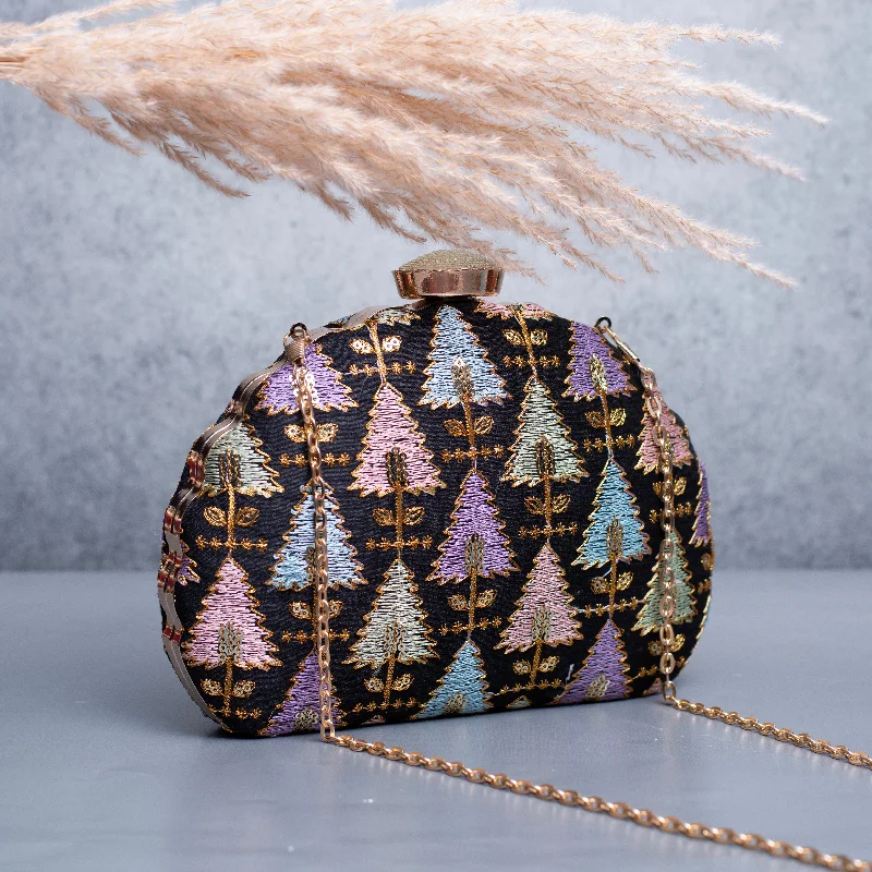 Velvet clutch with a tassel detail for a bohemian - chic styleArtklim Black Based Multicolored Threadwork Pattern Embroidery Clutch