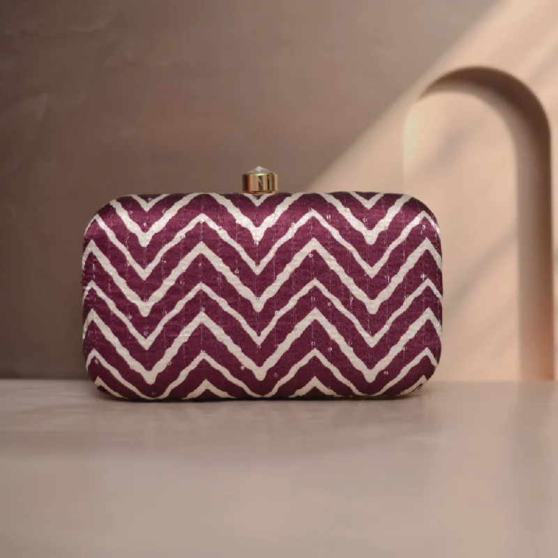 Monogrammed clutch as a personalized evening accessoryArtklim  Maroon And White Zigzag Printed Clutch