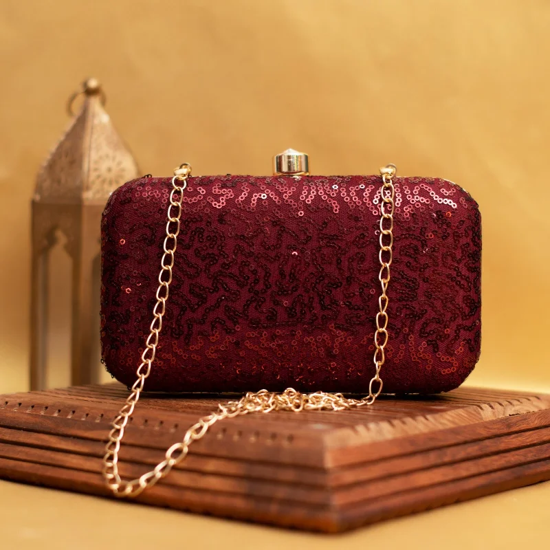 Miniature evening bag with a fold - over clasp for a compact optionArtklim Maroon Sequins Party Clutch