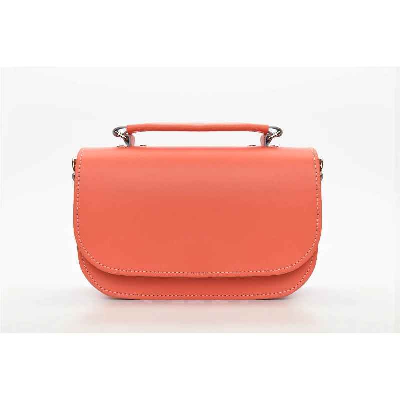 Laser-cut leather satchel with an intricate geometric designAura Handmade Leather Bag - Coral