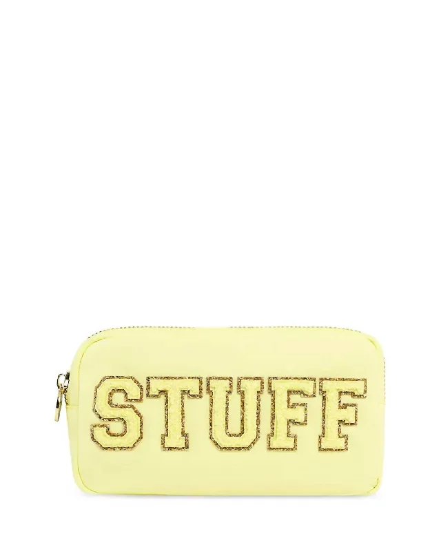 Two - tone clutch with a contrast color lining for added styleClassic Small Pouch In Banana Stuff