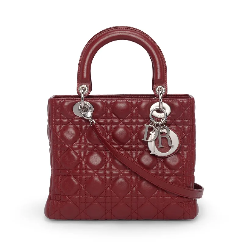 Laser - cut leather handle bag with a geometric pattern for a modern and edgy lookDior Burgundy Cannage Lambskin Medium Lady Dior