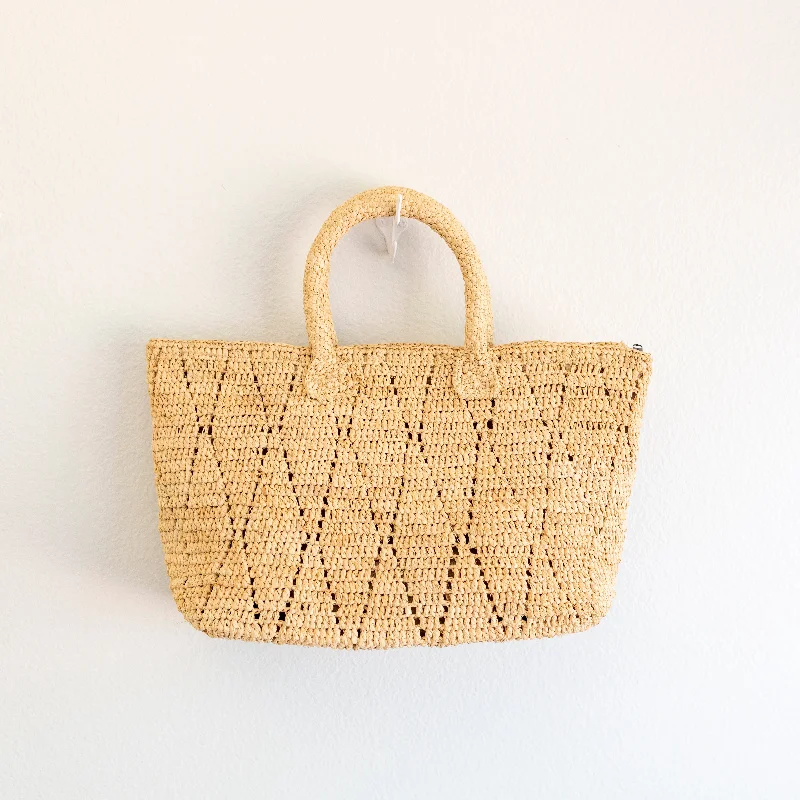 Color - blocked handle bag with a combination of bright and neutral colorsElena Handbags Hand Woven Fashion Raffia Top Handle Beach Bag