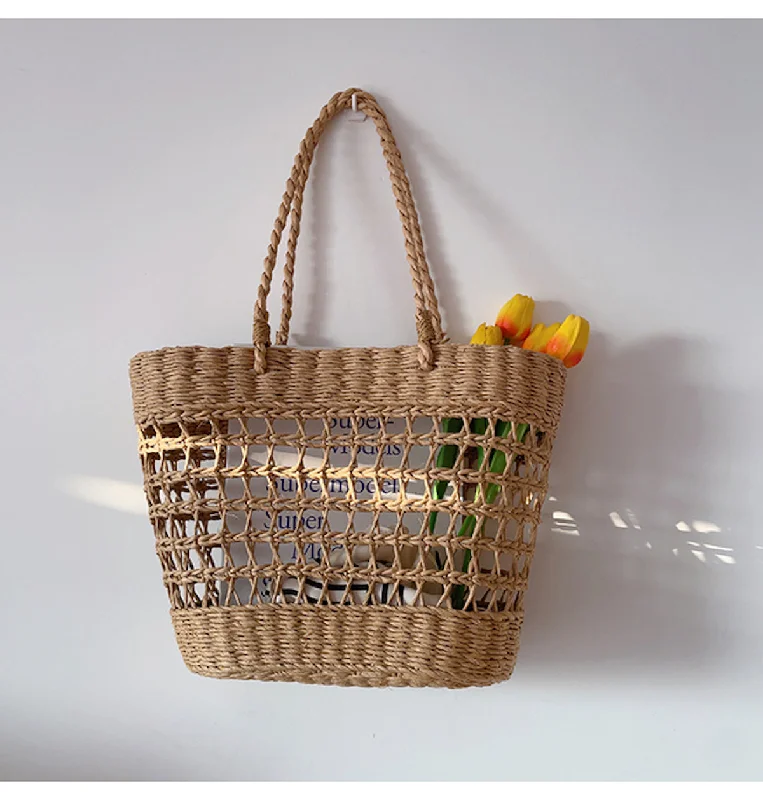 Studded handle bag with a punk - rock aesthetic for a bold fashion choiceElena Handbags Straw Beach Tote Basket