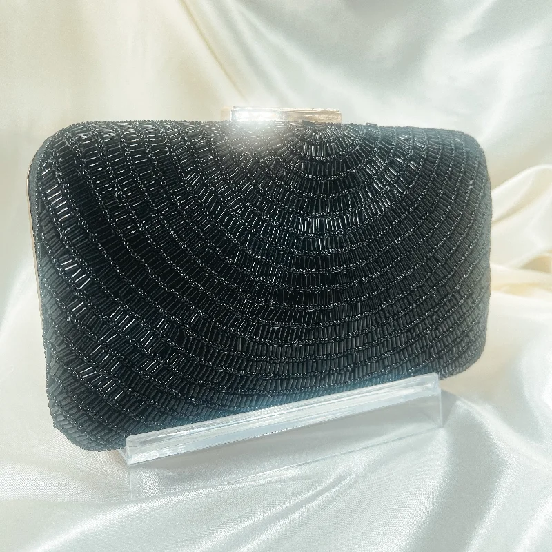 Embroidered silk clutch with a traditional motif for a cultural touchGALA Clutch (Black)