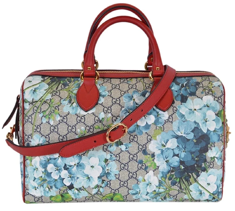 Satchel with a hidden anti-theft pocket for securityGucci blue GG Blooms Coated CanvasBoston Top Handle Bag