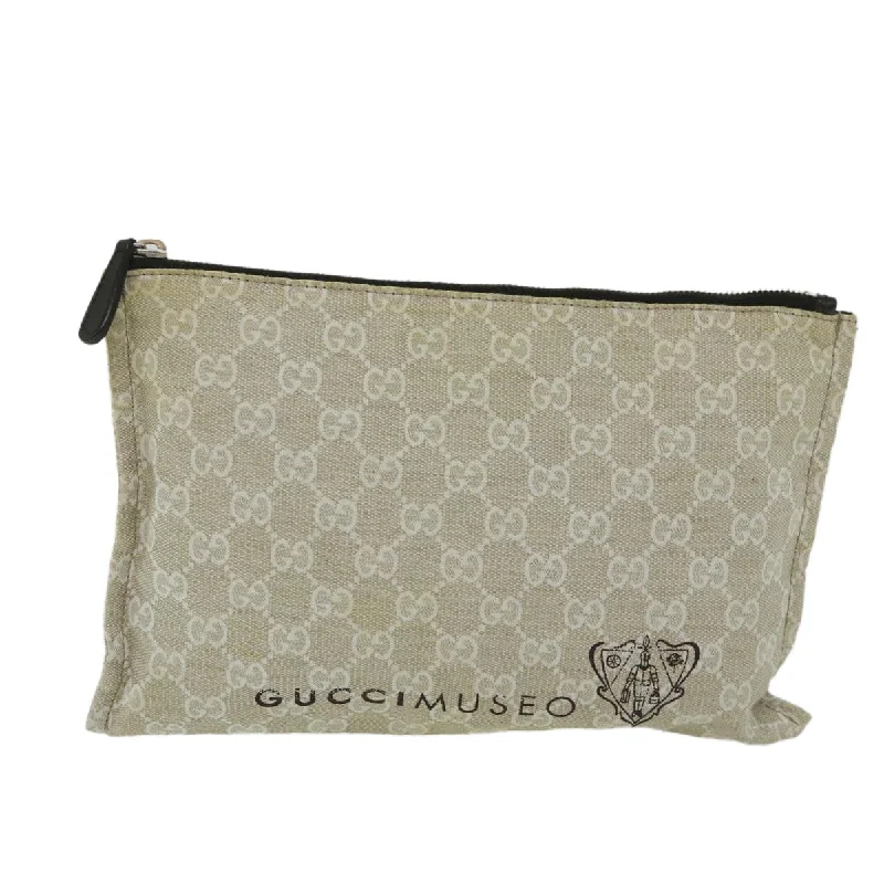 Two - tone clutch with a contrast color lining for added styleGucci Gg Canvas  Canvas Clutch Bag (Pre-Owned)