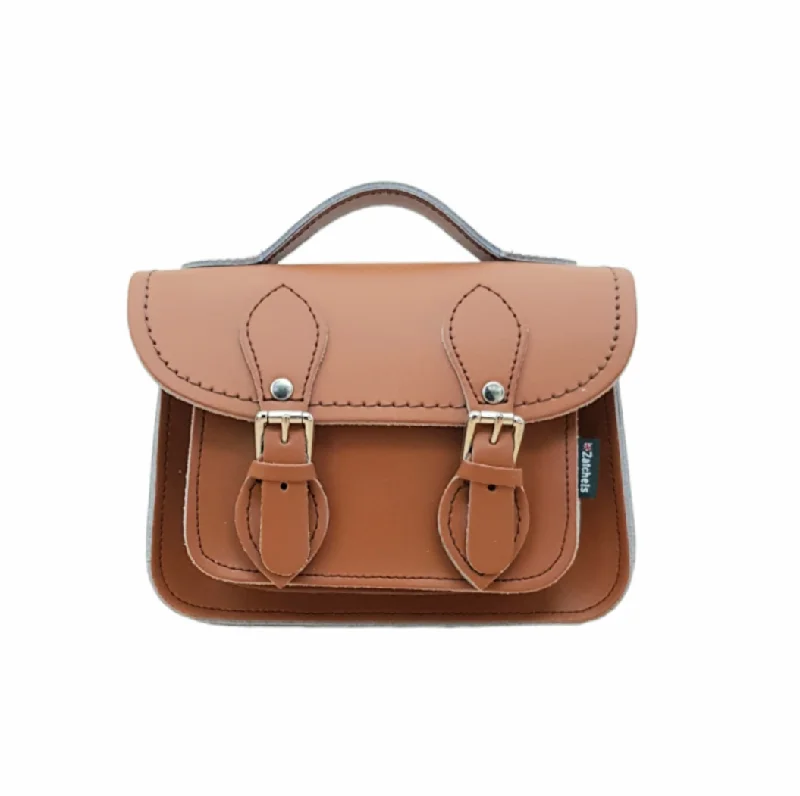 Laser-cut leather satchel with an intricate geometric designHandmade Leather Micro Satchel - Burnt Orange