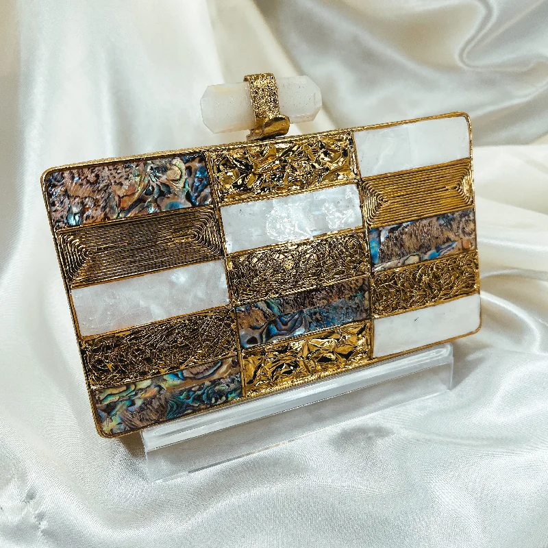 Mother - of - pearl clutch with a delicate sheenMEERA Clutch