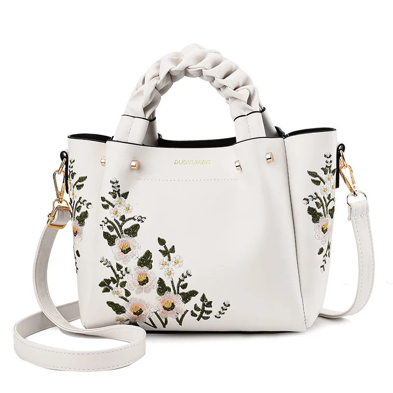 Women's silk - lined leather makeup bags with multiple compartmentsNew Arrival Flower Embroidery Solid Color Handbag Large Capacity Crossbody Bag Shoulder Bag Set For Women