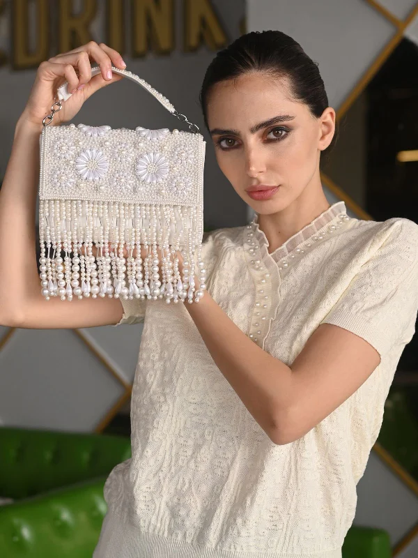 Lace - covered clutch for a romantic and feminine lookOdette White Tassels Embellished Clutch For Women