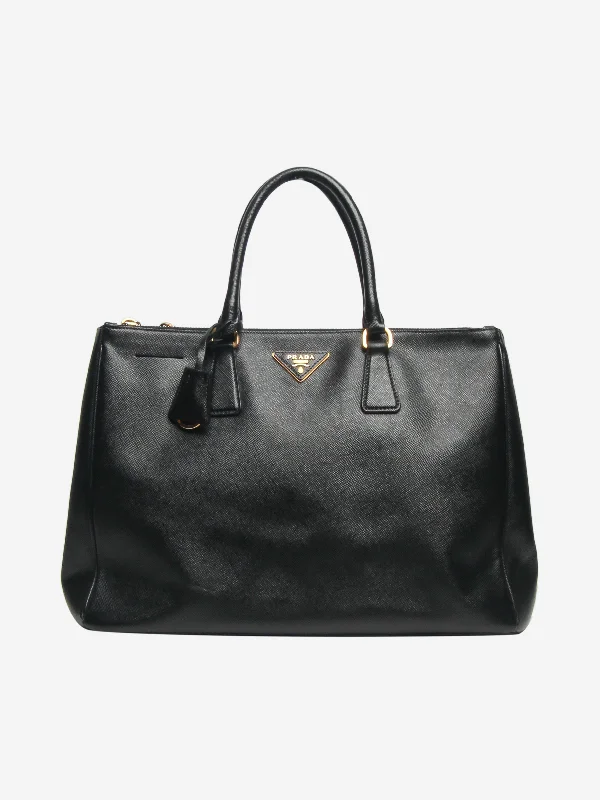 Women's genuine leather handle bag with a classic saddle shape and gold - tone hardwareBlack large Saffiano Galleria top handle bag