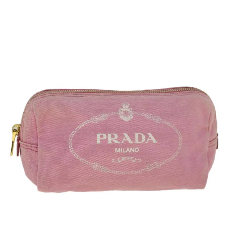 Velvet clutch with a tassel detail for a bohemian - chic stylePrada  Canvas Clutch Bag (Pre-Owned)