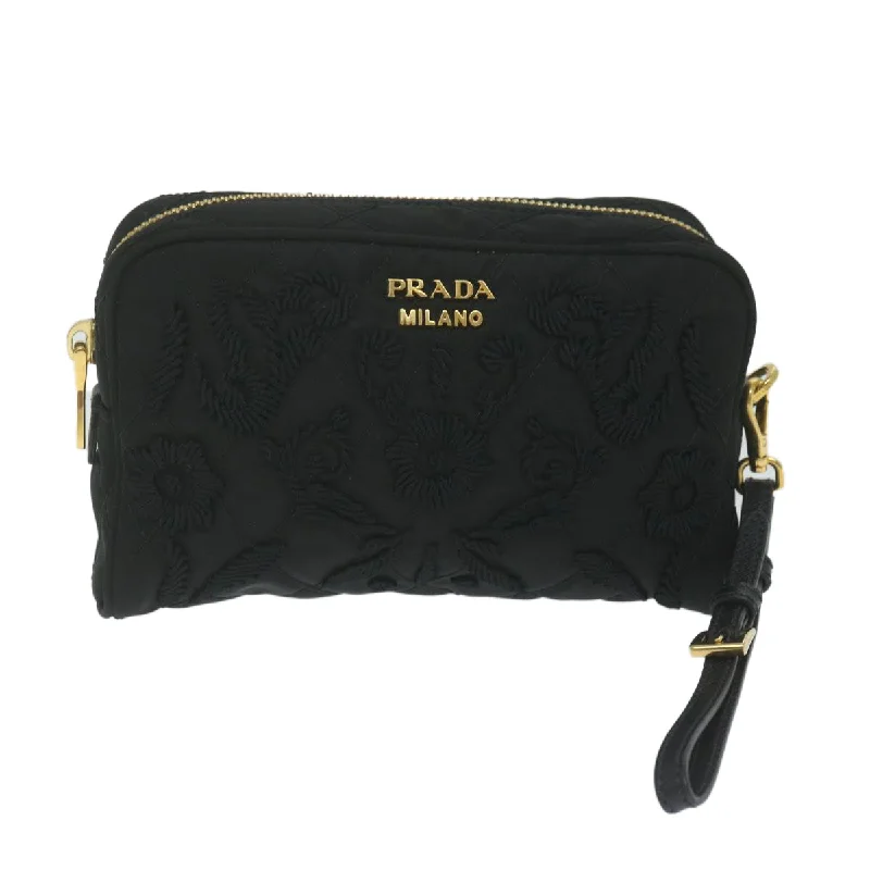 Monogrammed clutch as a personalized evening accessoryPrada Tessuto  Synthetic Clutch Bag (Pre-Owned)