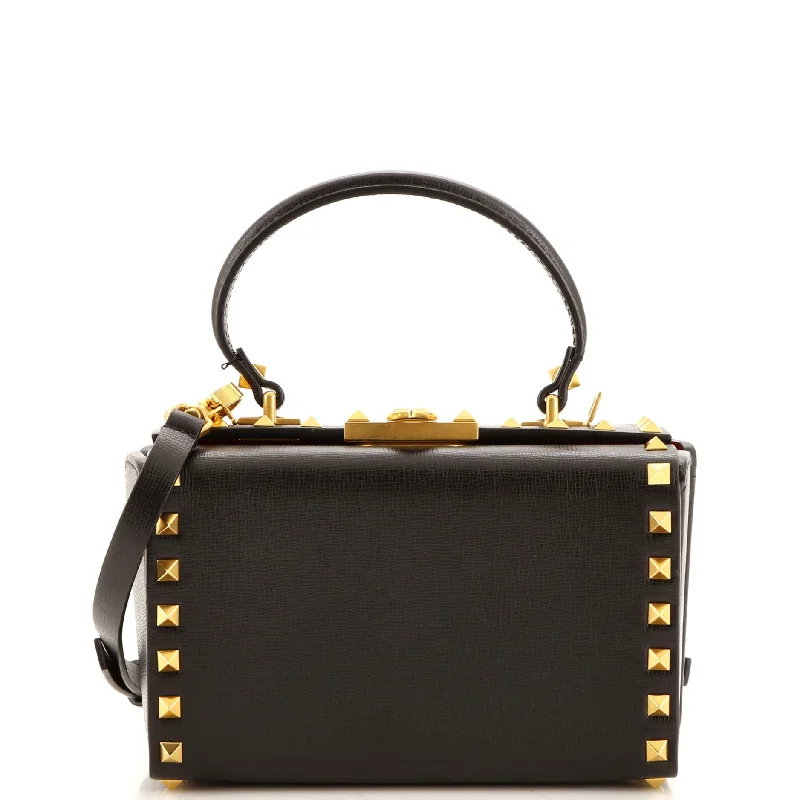 Vintage-inspired satchel with a brass buckle and leather tasselsRockstud Alcove Box Bag Leather