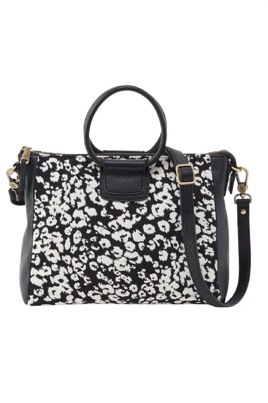 Color-blocked satchel with bold and bright colors for a trendy lookSheila Medium Satchel Bag In Black & White Leopard