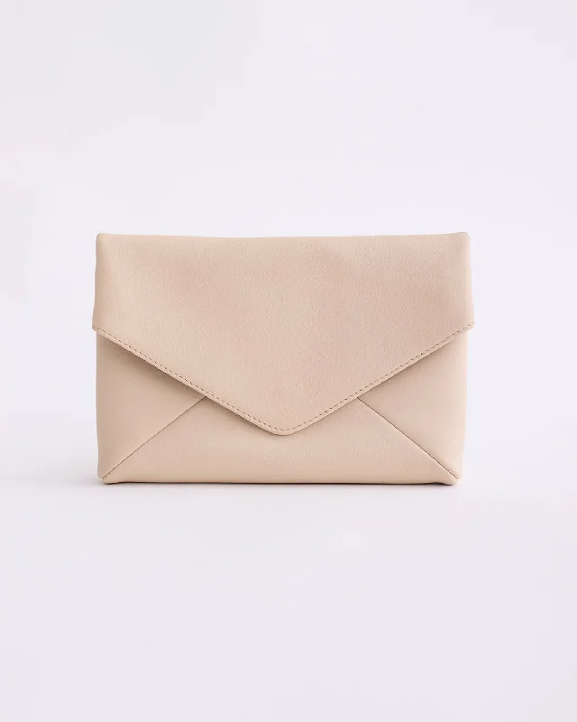 Velvet clutch with a tassel detail for a bohemian - chic styleStella Envelope Clutch: Oat