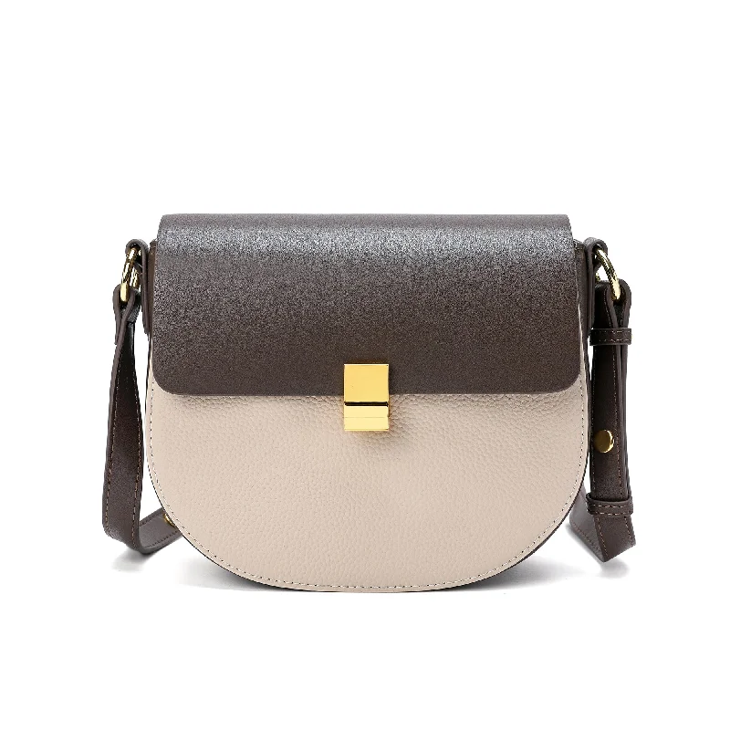 Laser - cut leather shoulder bag with an abstract pattern for a modern touchTiffany & Fred two tone full-grain Crossbody/Shoulder Bag Laser - cut leather shoulder bag with an abstract pattern for a modern touchTiffany & Fred two tone full-grain Crossbody/Shoulder Bag