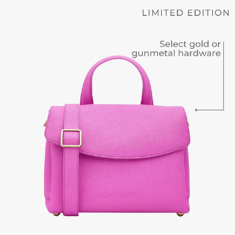 Color - blocked handle bag with a combination of bright and neutral colorsTryhard Top Handle Bag -- Fuchsia