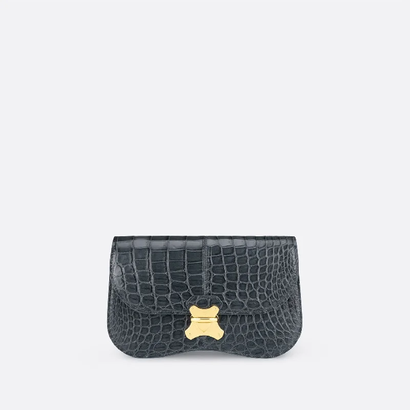 Geometric - shaped evening bag for a contemporary aestheticVELA BALLAD CHAIN WALLET